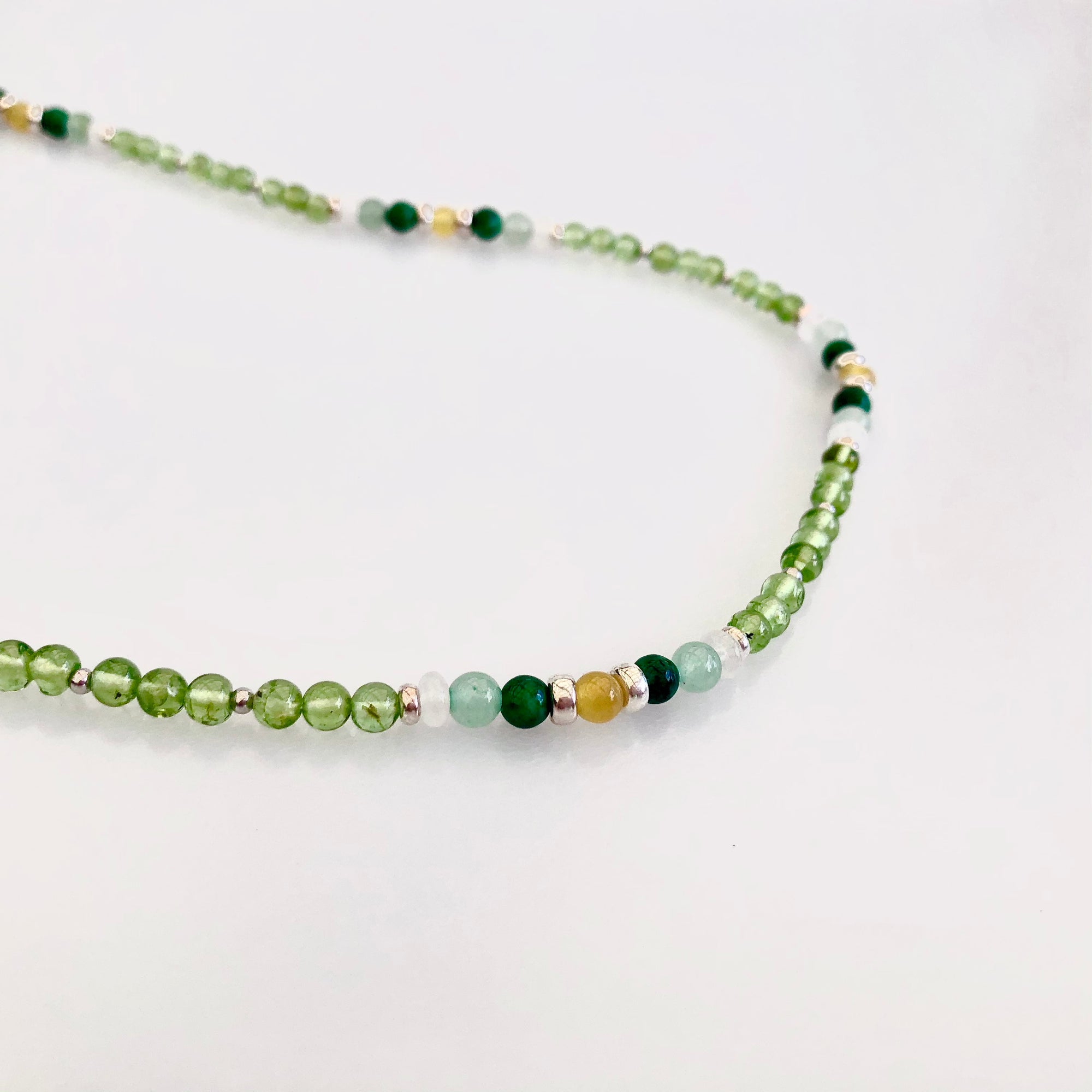 Yun Boutique, Asian Boutique Jewelry from New York. Multistyle, Peridot necklace, August Birthstone necklace, sterling silver necklace, lariat necklace, beaded necklace, green stone necklace, green crystal necklace, green beads necklace, long beaded necklace, crystal beads necklace, handmade necklace, gemstone necklace,  crystal necklace for women, healing crystal necklace, real crystal necklace. 