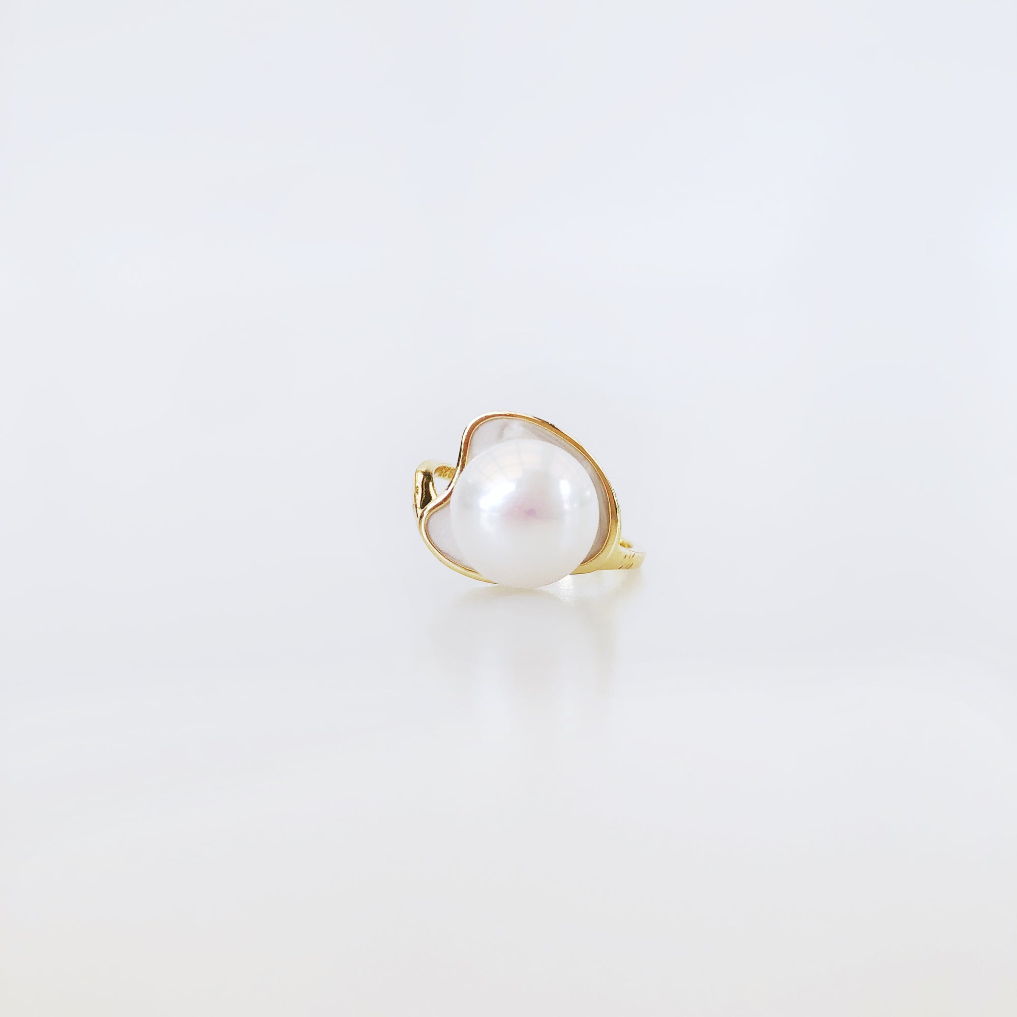 Adjustable White Enamel Pearl Ring. Asian Boutique Jewelry from New York. Gold ring for women, contemporary jewelry, gold ring, sterling silver ring, pearl ring, gold ring for women, artistic ring, adjustable ring, enamel ring, vermeil ring, asian ring, boutique ring, asian jewelry, 